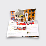 Building fire pop-up page from the Ultimate Spotlight Firefighters children’s book, showing firefighters using a ladder truck to reach a burning building on a light gray background.