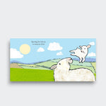 Page spread from Very Special You, showing a lamb leaping above a sheep in a sunny meadow, on a light gray background.