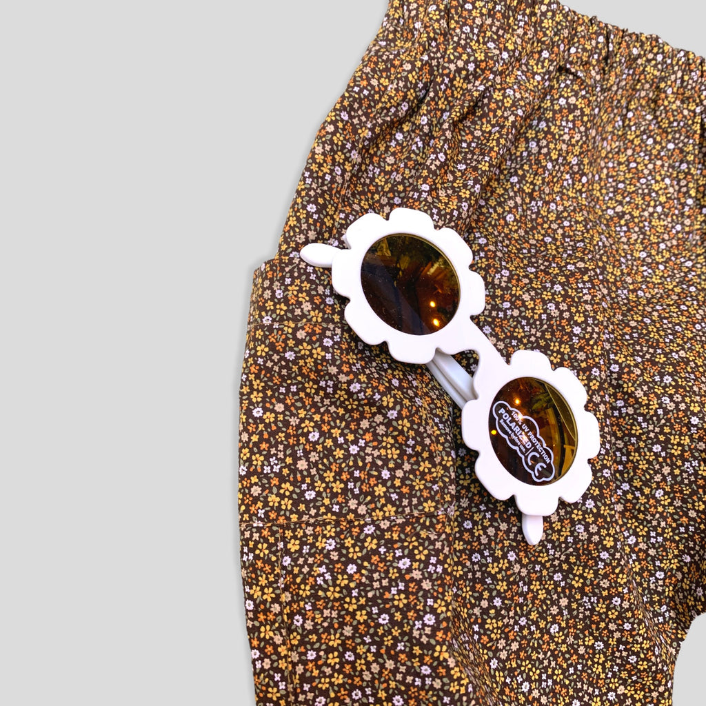 Cotton Golden Brown and Yellow Petite Fleur Harem Pants for Babies and Kids. Curated look with White Daisy Sunglasses (not included). Detail view.