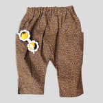 Cotton Golden Brown and Yellow Petite Fleur Harem Pants for Babies and Kids. Curated look with White Daisy Sunglasses (not included).